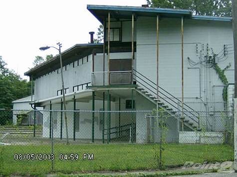 Side view of building from parking lot not seen from street