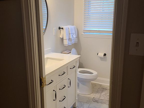 Remodeled 2nd bathroom, new vanity, tile shower and tub, fixtures, and flooring