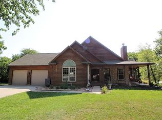 24400 S Persimmon Ln, Peculiar, MO 64078