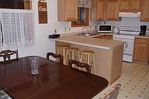 Open kitchen & dining room
						:
						Includes refrigerator, oven, dishwasher, garbage disposal.
