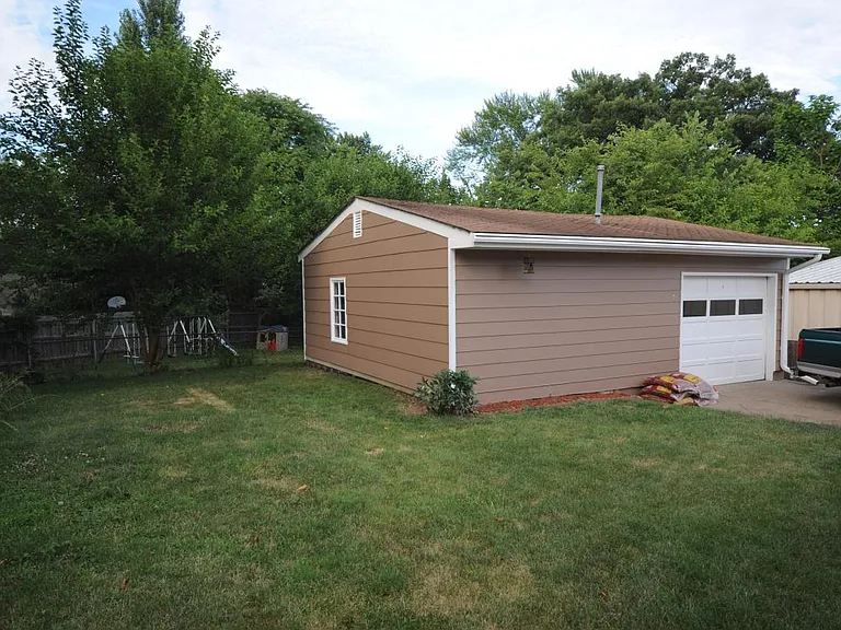 Garage, new siding with "Bonus room" w/ fireplace