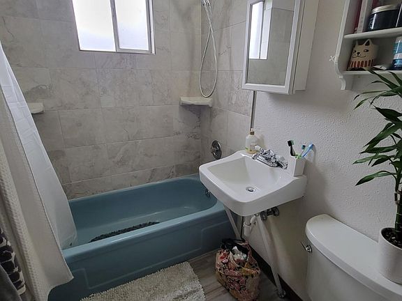 Comparable bathroom - newly re-tiled shower