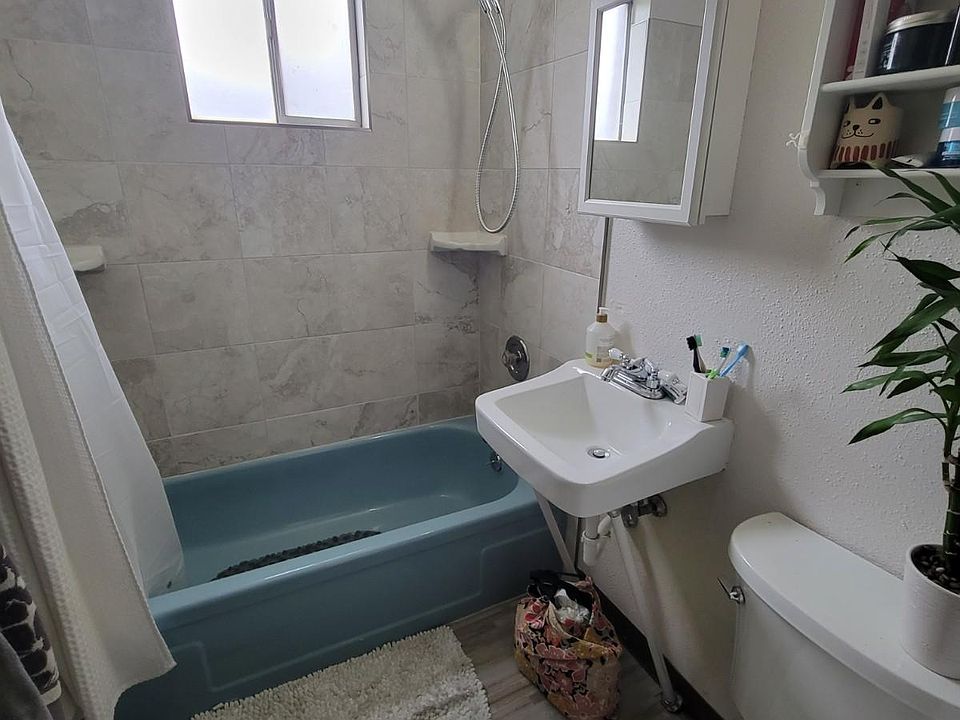 Comparable bathroom - newly re-tiled shower