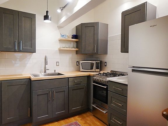 4th image of 83 Pleasant St APT 3