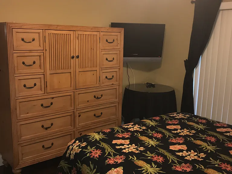2nd bedroom large dresser and TV