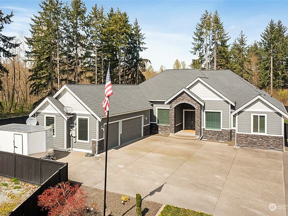 Welcome!Get ready to have every box checked with this incredible spacious rambler nestled on 7+ acres!>