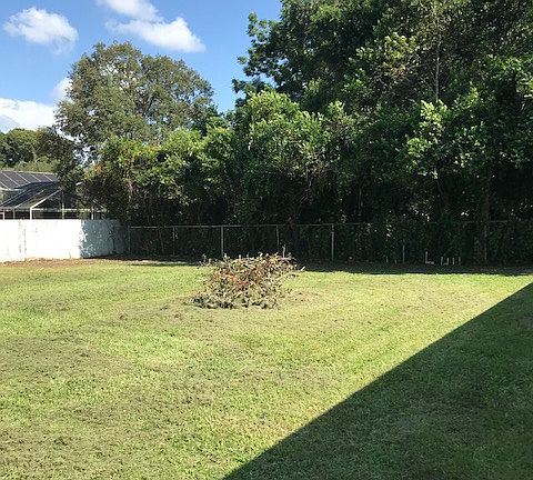 Large, fenced backyard.