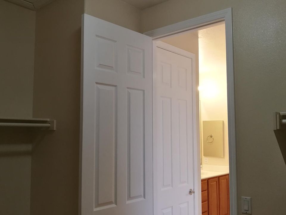 Inside master bedroom walk-in closet