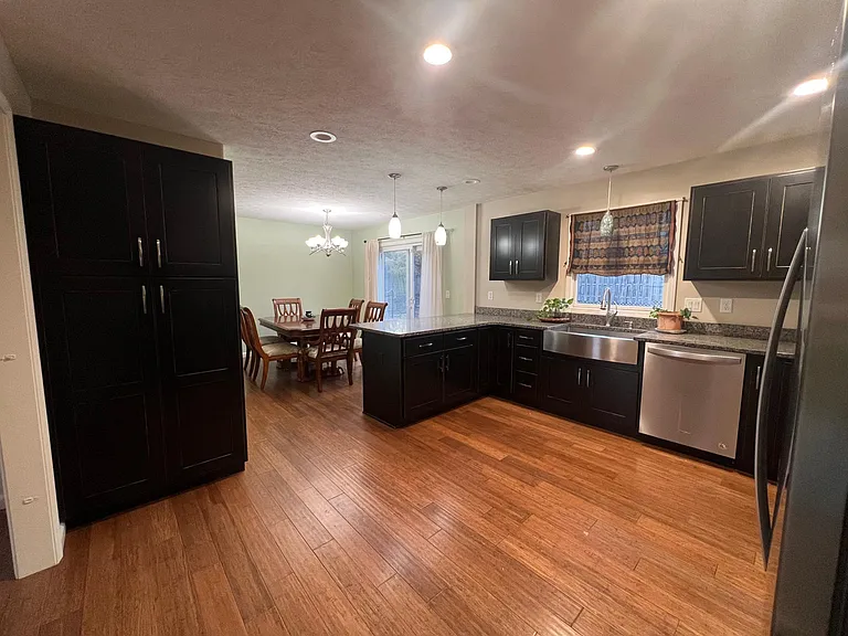 Kitchen and dining area. Large kitchen pantry.