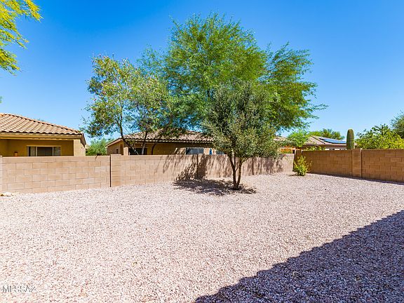 3rd image of 7568 W Sand River Way