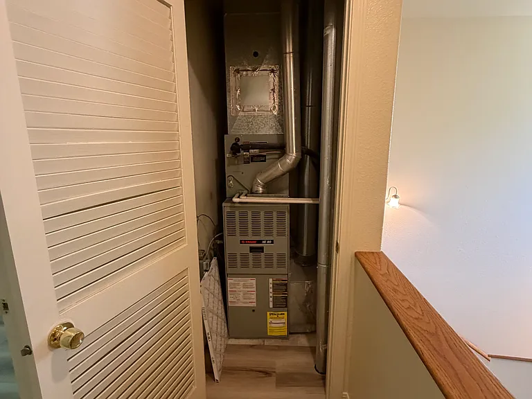 Utility closet off the upstairs hallway with the HVAC.