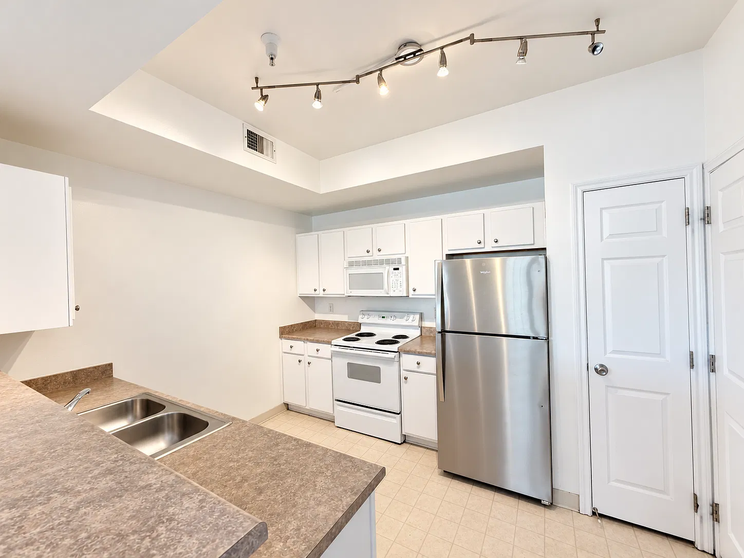 Bright 2-Bedroom Ironstone Condo with Covered Deck, Walk-In Closets & Resort-Style Amenities — Photo 4