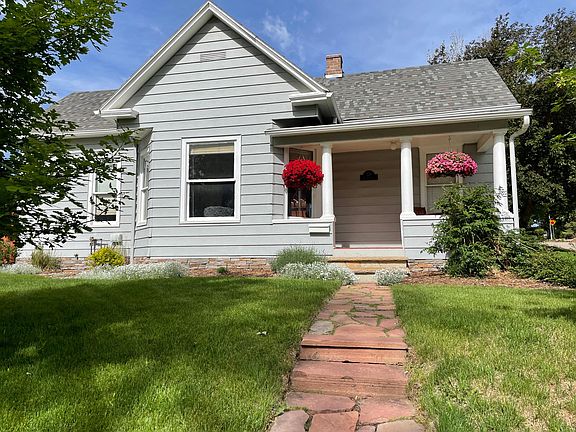 Flagstone walkway to covered front porch.