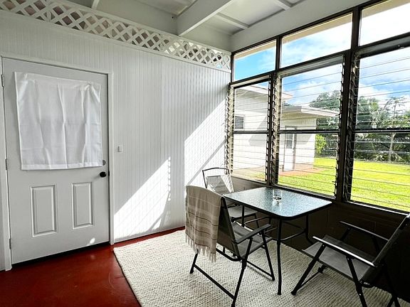 Bonus sun room and main entrance from garage area
