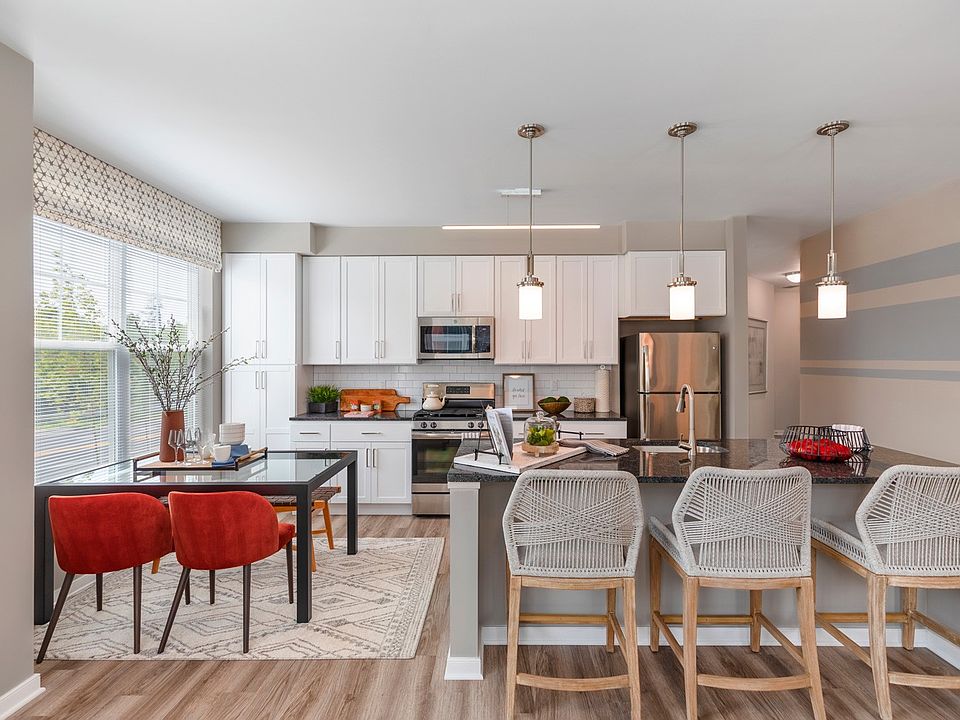 Modern kitchens with solid wood cabinetry, granite counters and stainless appliances