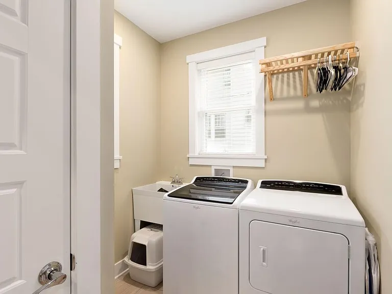 Laundry Room on Main with Sink and Washer/Dryer