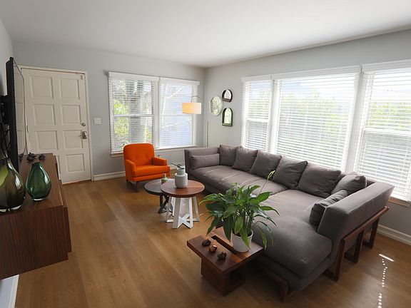 Beautiful sunlight basks this gorgeous living room.
