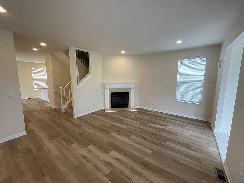 Open Bright Living Room With Fireplace