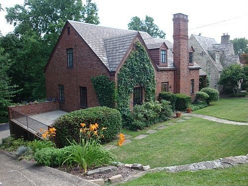 Front view with large side patio