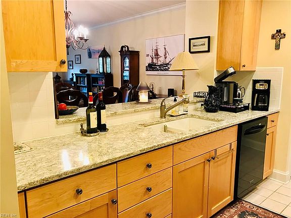 New upscale quartz countertops with undermount sink.