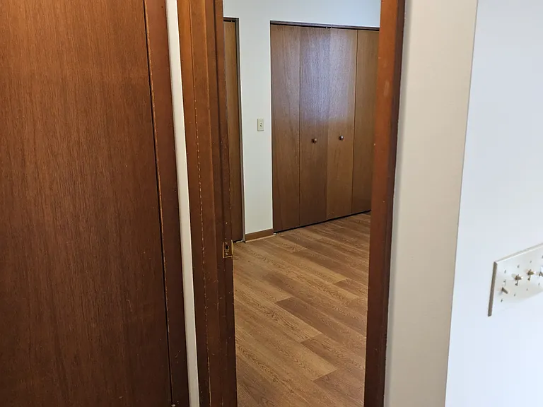 Hall door to larger bedroom