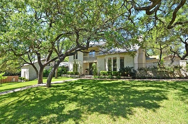 Welcome to a home that will "Wow" you. Truly majestic from the street and a home that has something 