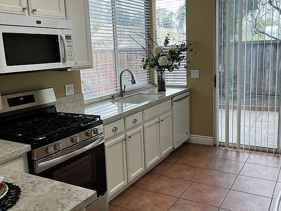 Bright kitchen with new range