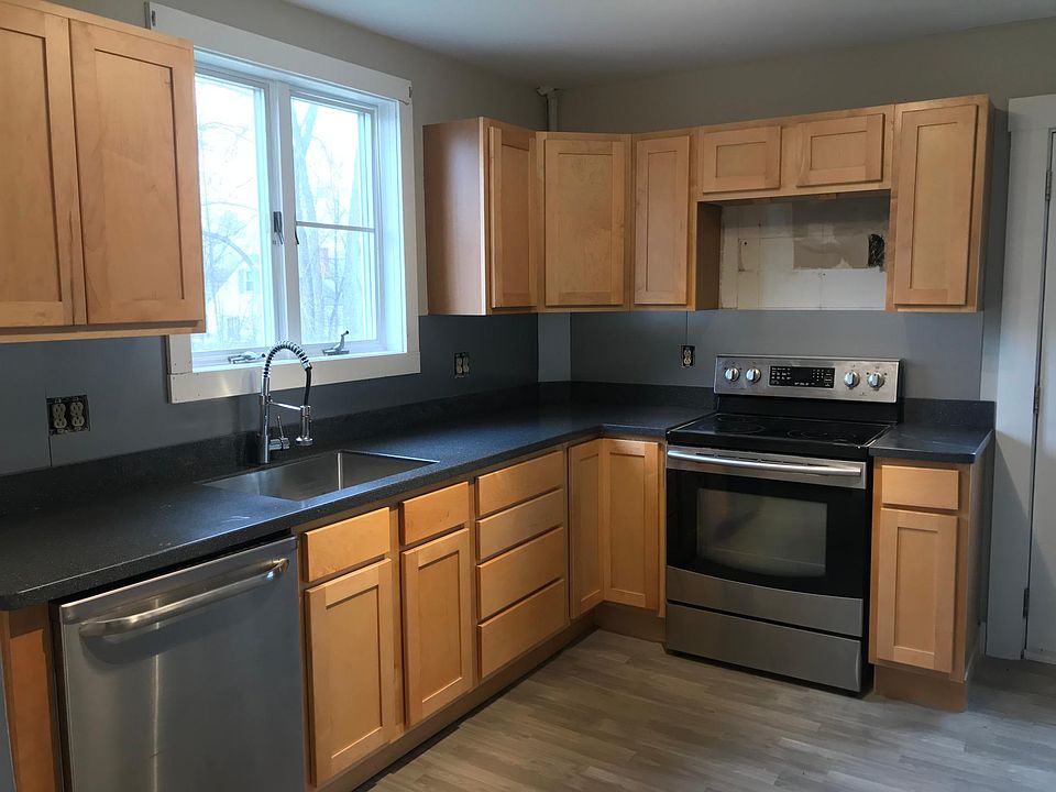 Brand new kitchen with stainless and solid surface counter tops