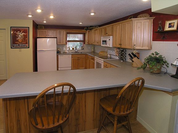 Enormous kitchen has seating for 12