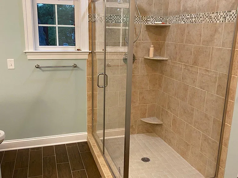 Master bathroom. Floor is tile.