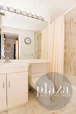 Sold by Plaza Real Estate Group | media 11