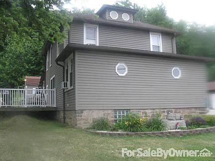 Front of house facing Rt 56 : Has composite decking on left