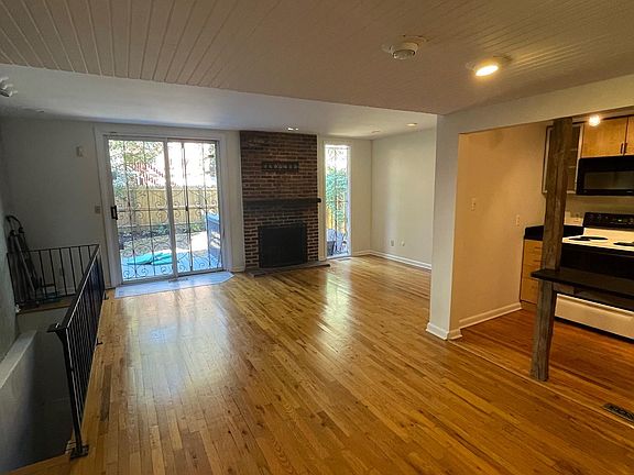 Open living space with cozy wood-burning fireplace