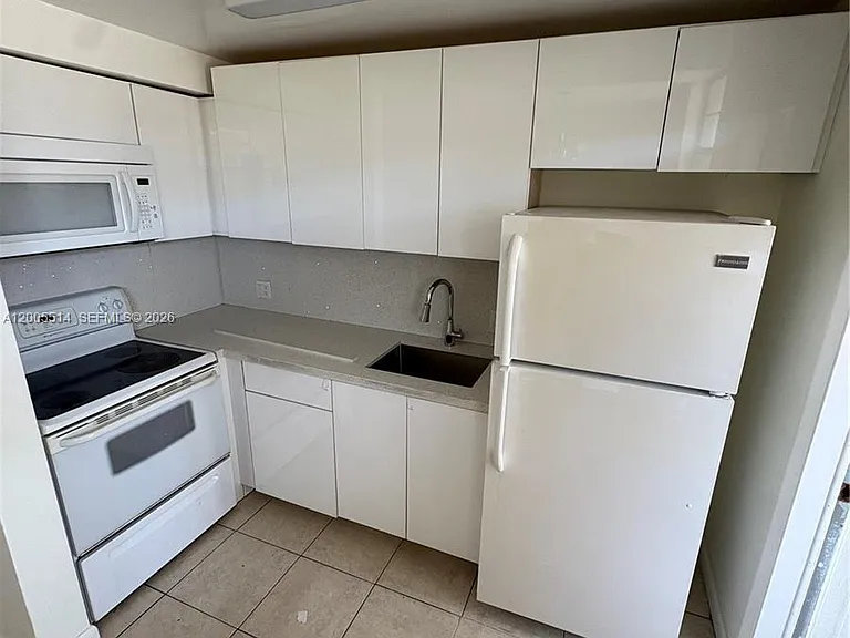 1515 NE 125th Ter #212 — Photo 1