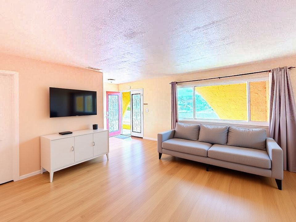 The flooring is scheduled to be replaced with new LVP flooring. The current photo includes temporary staging to help visualize the space while improvements are being completed.