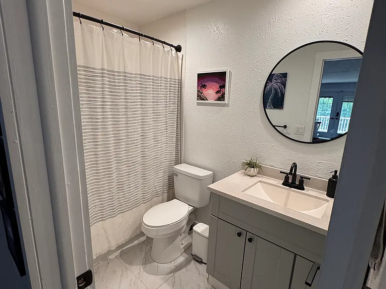 Full bathroom with tub