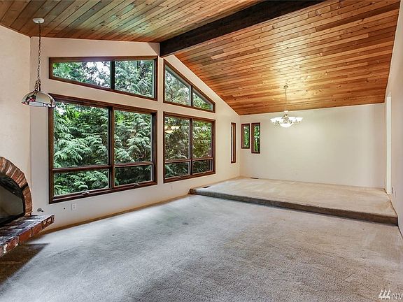 The soaring ceilings and tongue & groove and exposed beams make this a dramatic space.