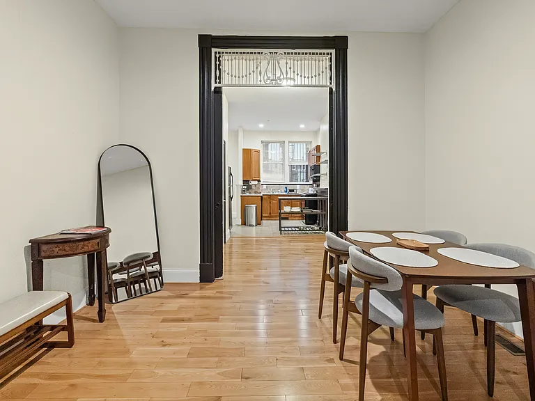 Dining area with open view to the kitchen.