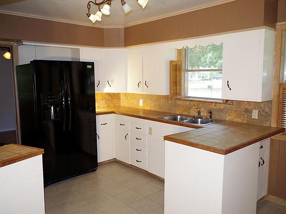 View one of this stunning newly remodeled kitchen. Tons of counter space and cabinets.