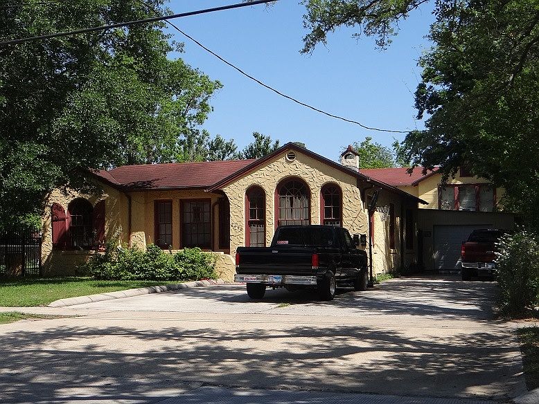 House in Front of Apartment