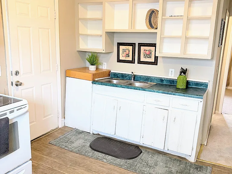 Side entrance to kitchen .