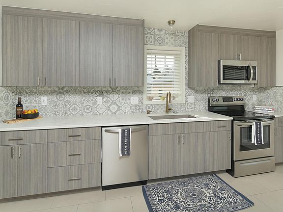 You won't want to leave this kitchen it's so beautiful!