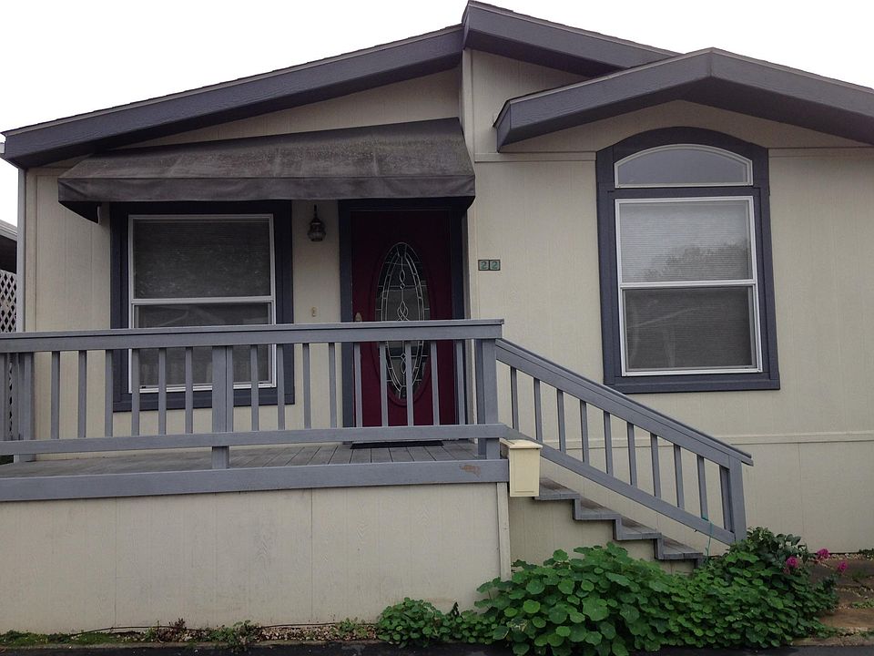 Covered entry, custom door, spacious deck