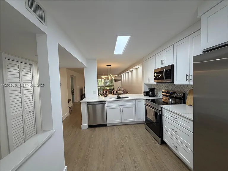 7350 Kinghurst Dr #305 — Photo 24