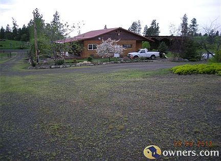 East side view of house