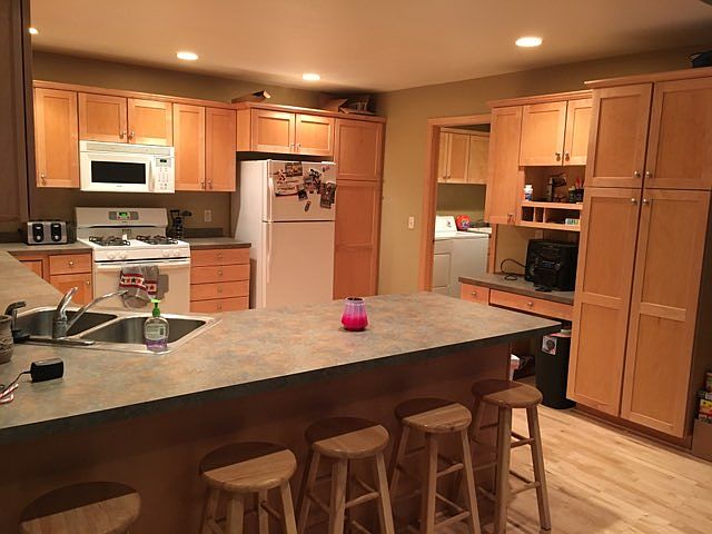 Awesome kitchen with breakfast counter, dishwasher and lots of storage.