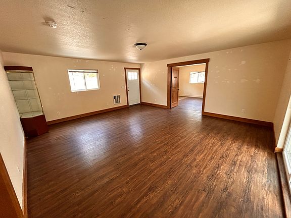 Large living room with access to stream out back