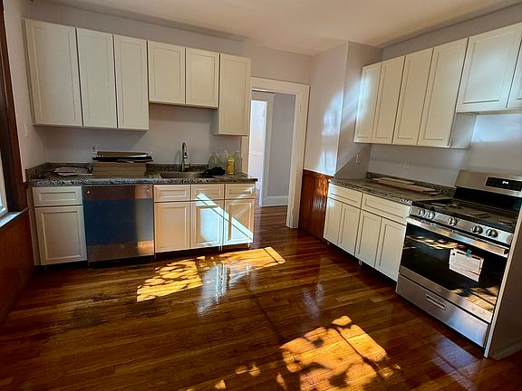 Two counter top spaces in kitchen with ample space for a table or island. All new appliances.