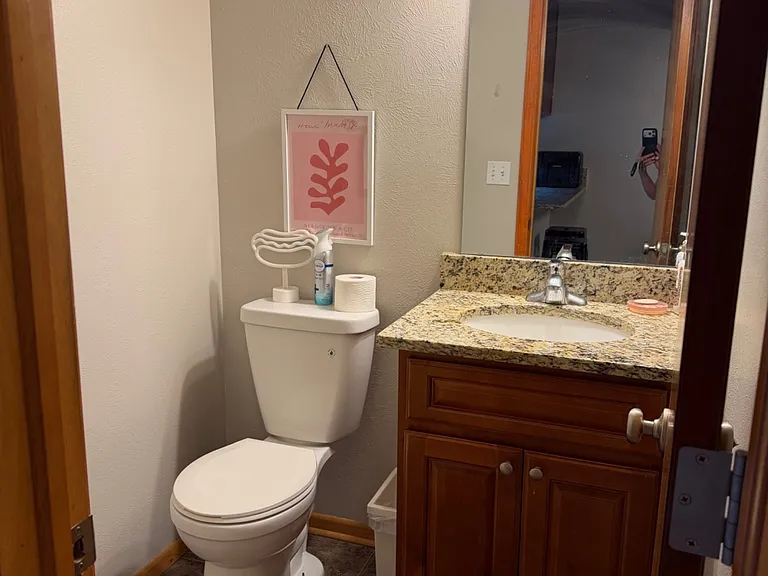1/2 bath on 1st floor, off of kitchen, living, dining room