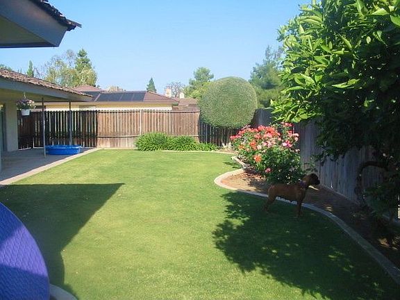 Landscaped with fruit trees, roses, gardenias, lillies and more!